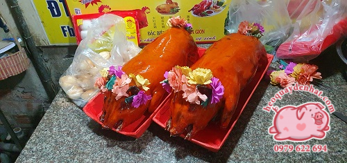 Heo quay nguyên con tphcm giá bao nhiêu